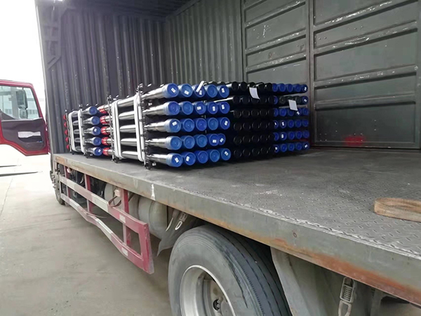 OCTG pipes loaded on truck for delivery