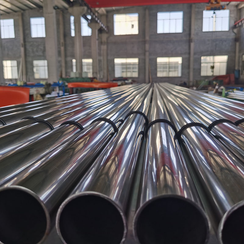 Polished stainless pipe in workshop